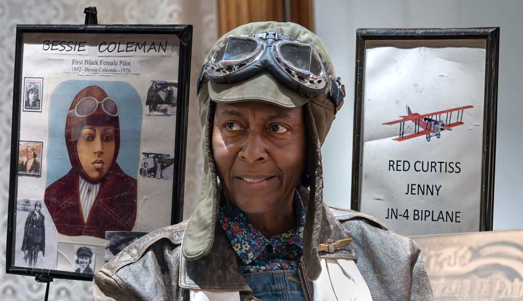 Daisy Nelson-Century performs a portrayal of Bessie Coleman at the Gloucester County Historical Society.