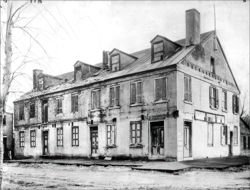 The delapidated hulk of the 208-year-old Hugg's tavern in Gloucester City, NJ, before its 1928 demolition.